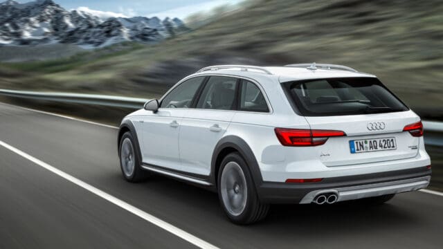 Audi A4 Allroad In Motion On Scenic Highway Wallpaper