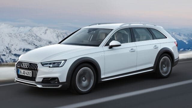 Audi A4 Allroad In Snowy Mountain Landscape Wallpaper
