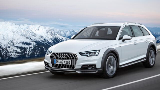 Audi A4 Allroad In Snowy Mountain Scenery Wallpaper