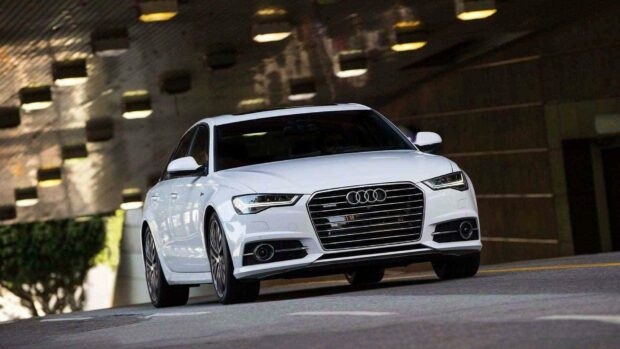 A white Audi A6 is driving on a city street under an architectural ceiling, HD Desktop Wallpaper