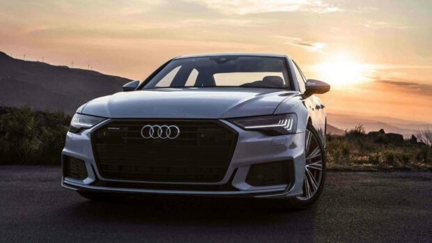 The Audi A6 is parked on a mountain road during sunset, HD Desktop Wallpaper