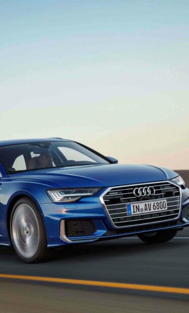 A blue Audi A6 is driving fast on a highway at sunset, HD Mobile Wallpaper