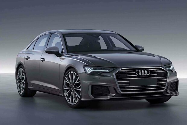 A sleek Audi A6 is shown in a studio setting highlighting its modern design, 2K Desktop Wallpaper