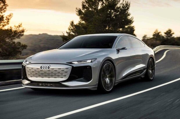 A silver Audi A6 is driving smoothly on a curved road surrounded by trees, HD Desktop Wallpaper