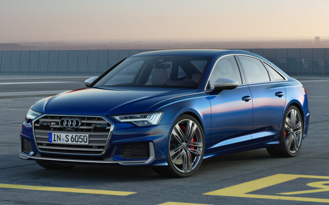 Audi S6 Blue Luxury Sedan Parked On Urban Rooftop Stunning Wallpaper