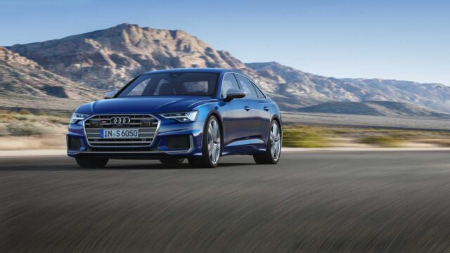 Audi S6 Blue Sedan Driving On Desert Road Stunning Wallpapers