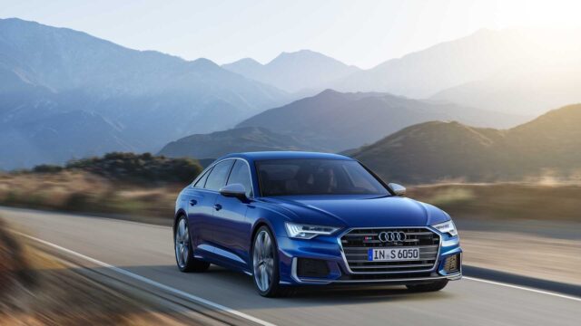 Audi S6 Driving On Scenic Mountain Road High Quality Wallpaper