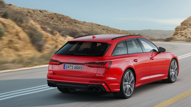 Audi S6 Red Sportback Driving On Mountain Road Wallpaper