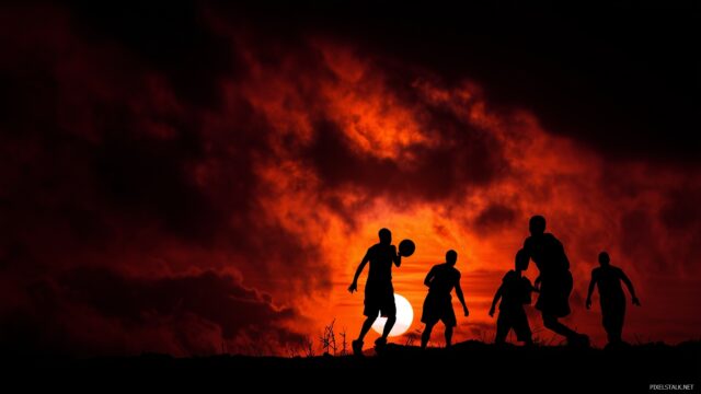 Awesome Basketball Wallpaper HD For PC, A Dynamic Image Showing Basketball Players In Silhouette Against A Fiery Sunset