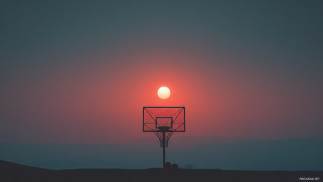 Awesome Basketball Wallpaper For Desktop Computer, A Minimalist Design Featuring A Basketball Hoop Against A Gradient Sky During Sunset
