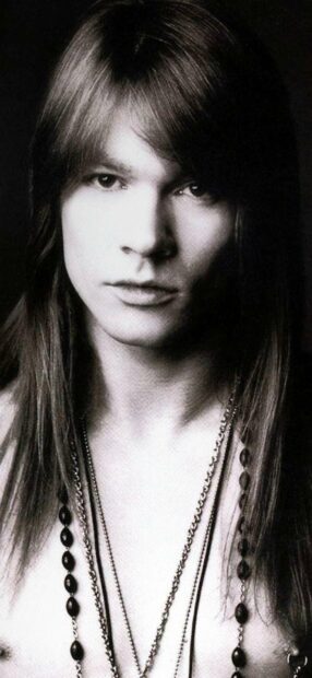 A close up portrait of Axl Rose with long hair and necklaces, HD Phone Wallpaper