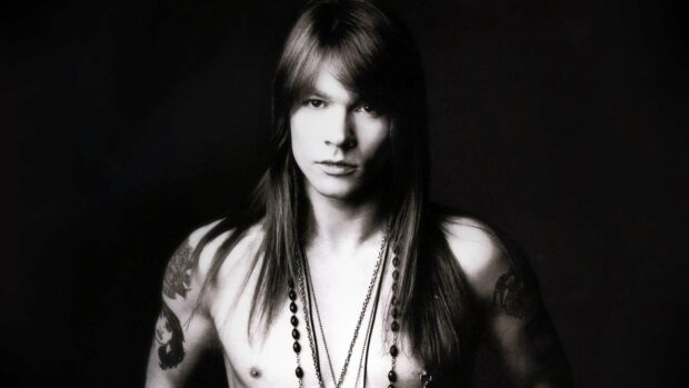 A close up of Axl Rose showing his long hair and tattoos on his shoulders, HD Desktop Wallpaper
