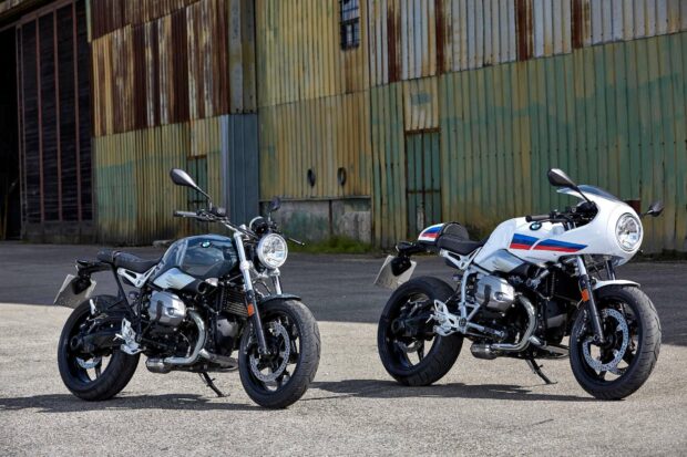 Two BMW R Nine T motorcycles parked outdoors near industrial buildings, HD Desktop Wallpaper