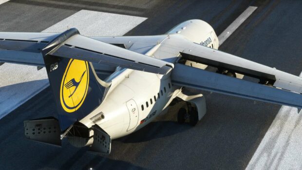 A Bae Avro aircraft with Lufthansa livery is parked on the airport tarmac under sunlight, HD Desktop Wallpaper