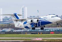 A Bae Avro aircraft with blue and white colors is taking off from the runway, HD Desktop Wallpaper