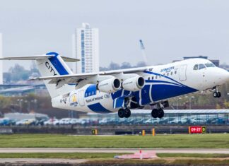 A Bae Avro aircraft with blue and white colors is taking off from the runway, HD Desktop Wallpaper