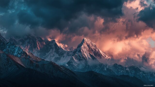 Best Background HD Wallpaper, A Breathtaking Mountain Range With Snow Capped Peaks Under A Dramatic Sky