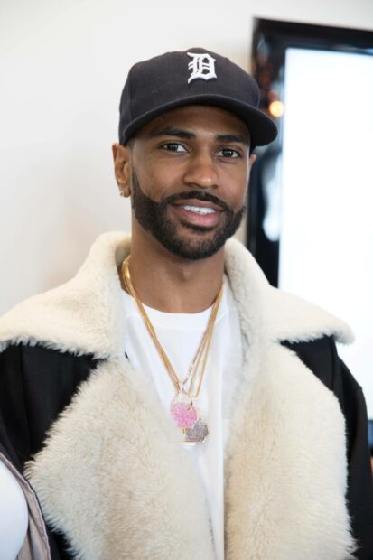 Big Sean is wearing a black cap and a fur coat, 2K Mobile Wallpaper