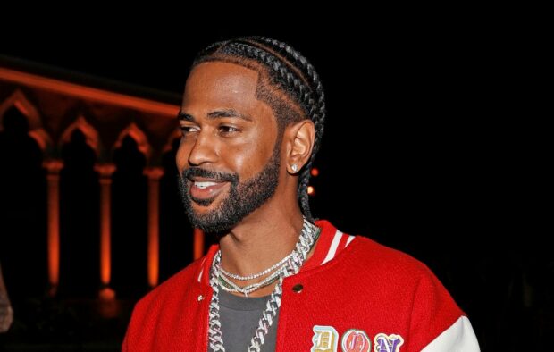 Big Sean smiling and wearing a red jacket with braided hair, HD Desktop Wallpaper