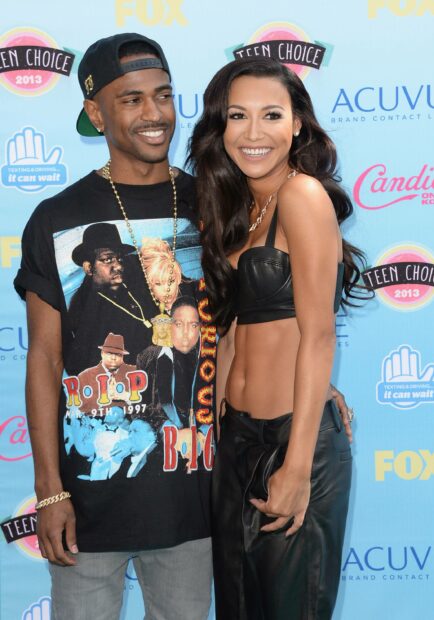 Big Sean is smiling and standing next to a woman at an event, 2K Desktop Wallpaper