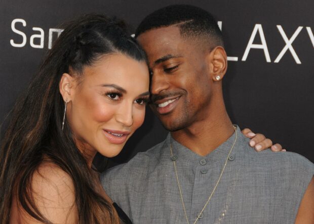 Big Sean smiling warmly next to a woman at an event, 2K Desktop Wallpaper