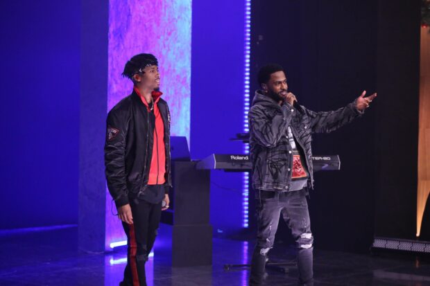 Big Sean and another artist performing on a brightly lit stage with musical equipment in the background, 2K Desktop Wallpaper