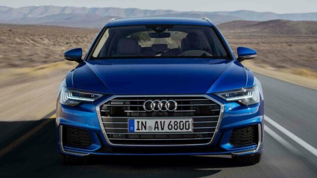 A blue Audi A6 car is driving on a desert highway in clear daylight, HD Desktop Wallpaper