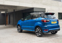 Blue Ford EcoSport In Modern Driveway Setting Wallpaper