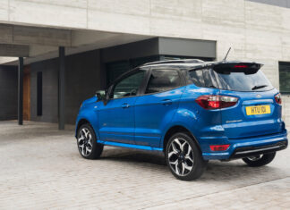 Blue Ford EcoSport In Modern Driveway Setting Wallpaper