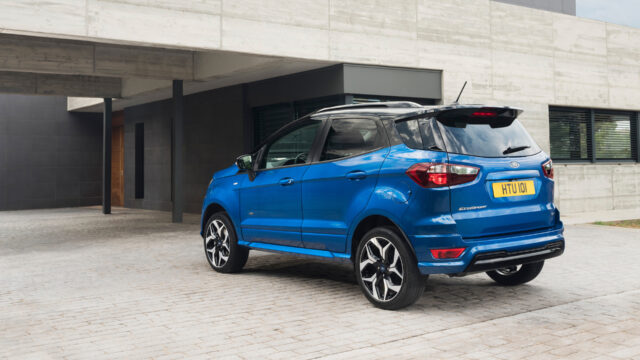 Blue Ford EcoSport In Modern Driveway Setting Wallpaper
