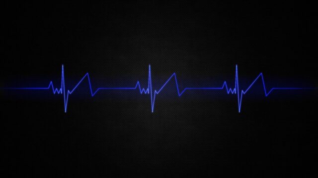 Blue Heartbeat Line On Black Background Wallpaper