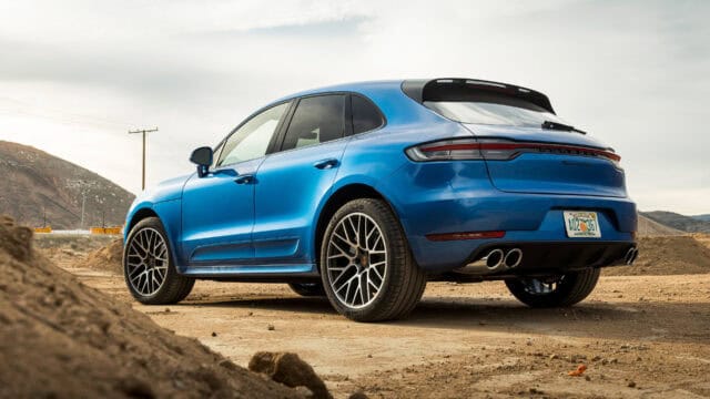 Blue Porsche Macan Turbo on Dirt Road High Quality Wallpapers