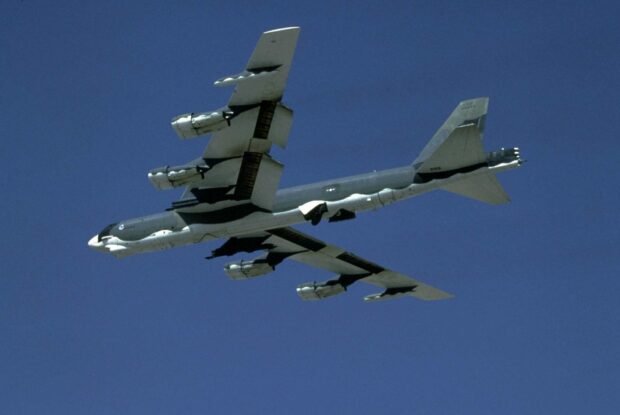 A Boeing B 52 is flying through a clear blue sky, HD Desktop Wallpaper