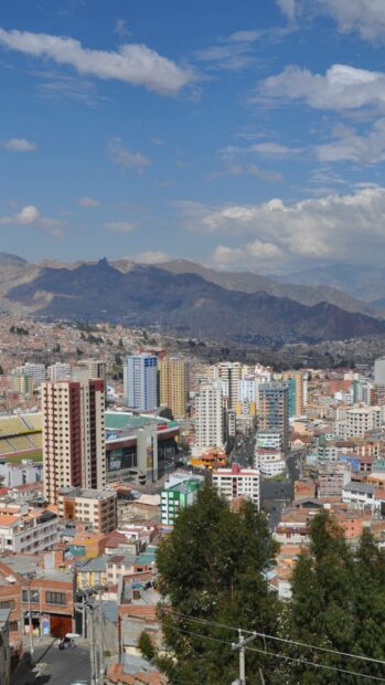A view of Bolivia cityscape with colorful buildings and mountains in the background, HD Mobile Wallpaper