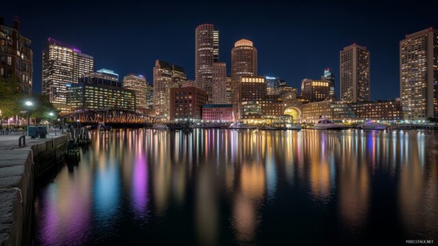 Boston Skyline Wallpaper HD, Nighttime Cityscape Of Boston Skyline Illuminated By City Lights With A Calm River Reflecting The Buildings