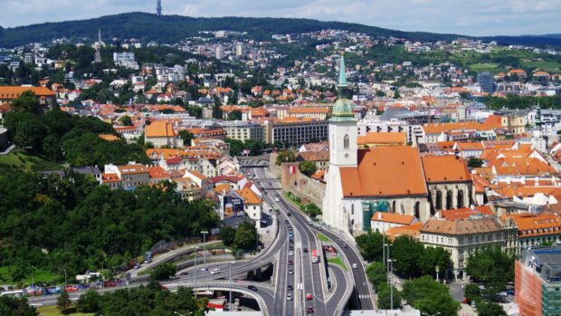 A panoramic view of Bratislava showing its historic buildings and roads, 4K Desktop Wallpaper