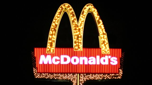 Bright McDonalds Logo Neon Sign on Dark Background for McDonalds Wallpapers