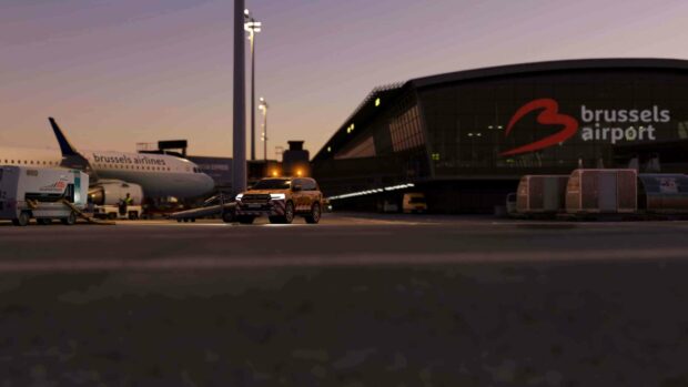 A Brussels Airlines plane is parked near the terminal at sunset, with an airport service vehicle in front, 4K Desktop Wallpaper