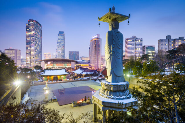 Buddha Statue Overlooking Seoul Cityscape South Korea Wallpaper