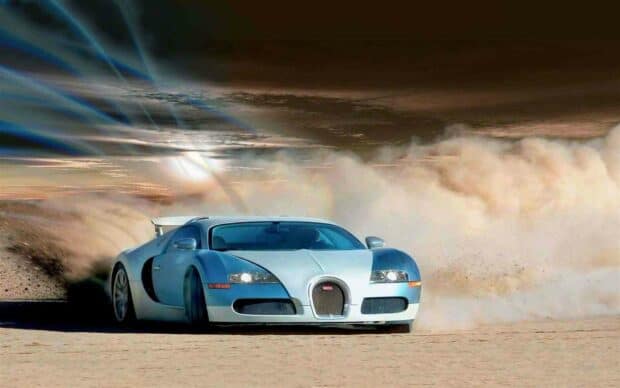 A Bugatti Veyron is drifting on a sandy desert with dust clouds in the background, HD Desktop Wallpaper