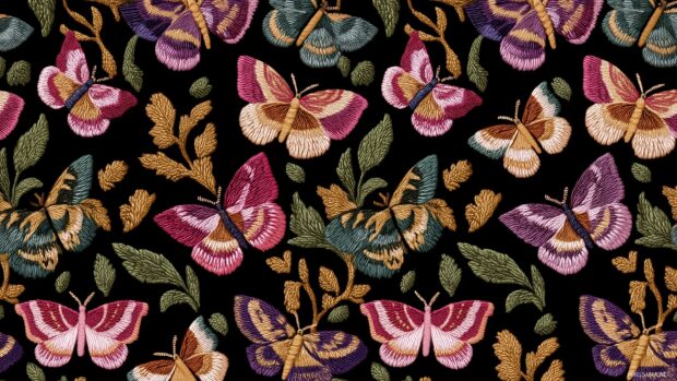 Butterfly Pattern HD, repeating motifs of butterflies woven into lush textiles for an elegant yet playful background.