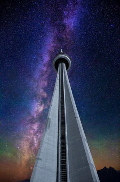 The CN Tower in Canada stands tall against a vibrant starry night sky, HD Mobile Wallpaper