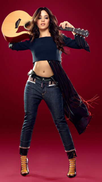 Camila Cabello Stylish Pose With Guitar Full Body Wallpaper On Red Background