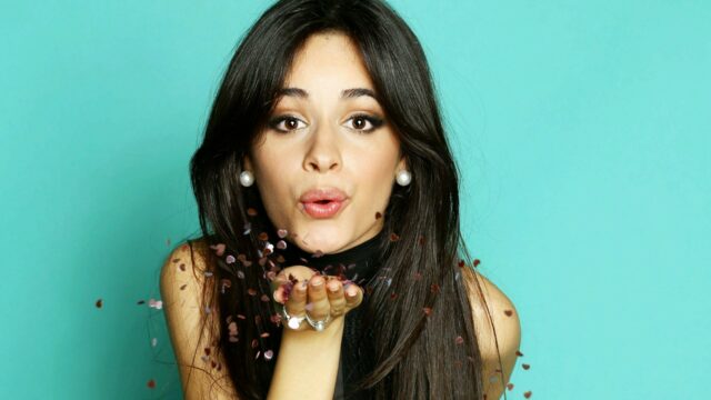 Camila Cabello Blowing Heart Confetti With Turquoise Background Beautiful Wallpaper