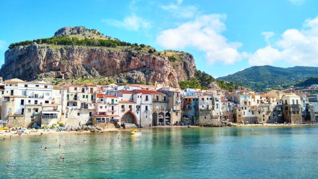 Cefalu Coastal Beauty Vibrant Village View Wallpaper