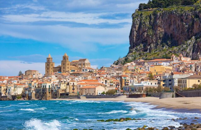 Cefalu Coastal Town And Cathedral Scenic Wallpaper