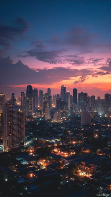Cell Phone Wallpaper HD Free Download, An Inspiring City Skyline At Dusk Illuminated By Bright Lights For A Modern Urban Phone Wallpaper