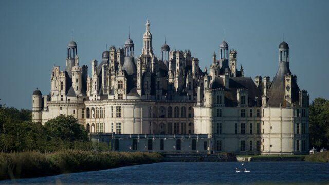 Chateau De Chambord Stunning Exterior View With River And Swans Wallpaper