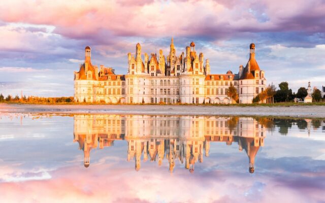 Chateau De Chambord Stunning Reflection Wallpaper At Sunset With Vibrant Sky Colors