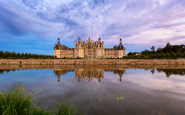 Chateau De Chambord Stunning Reflection Wallpaper With Scenic Sky And Surrounding Nature